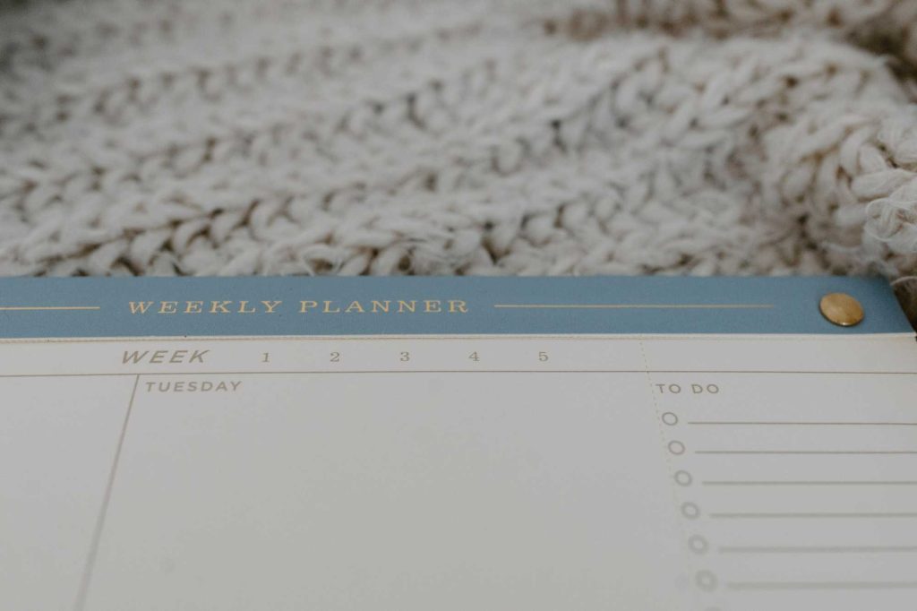 Close Up Shot Of Weekly Planner
