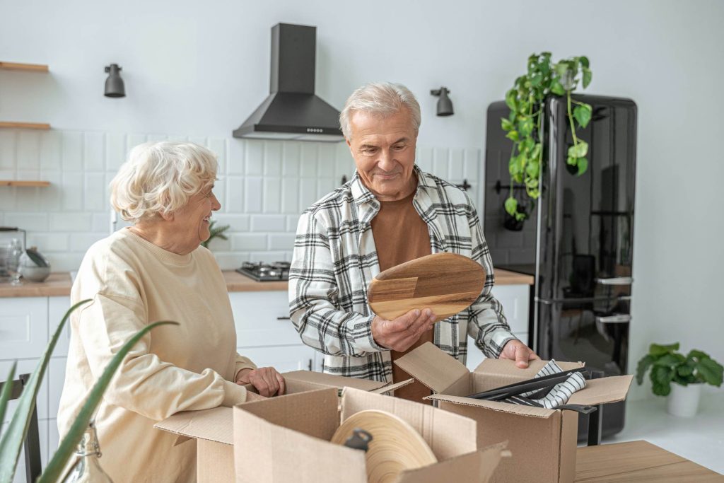 Senior Couple Unpacking Kitchen